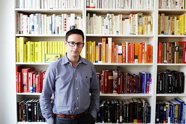 Nate Silver with his library